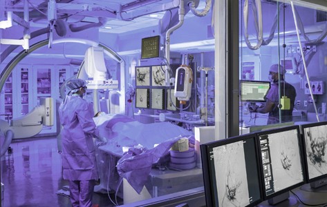 Doctor with patient during procedure