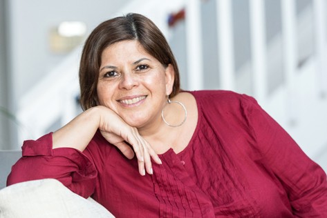 Overweight woman on sofa