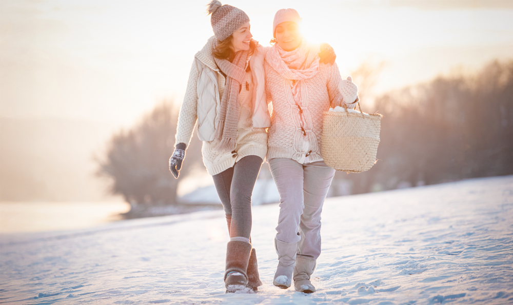 Two friends combatting winter fatigue with outdoor time.