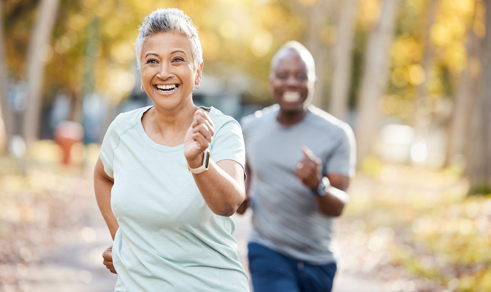 A woman and a man running.