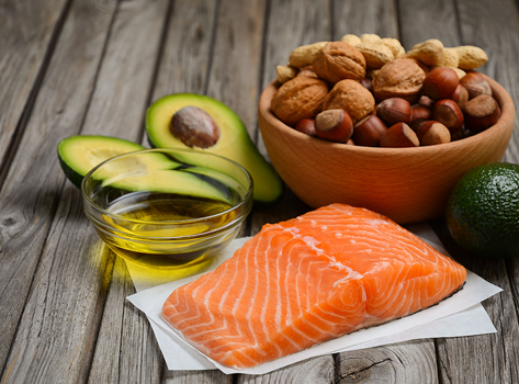 A selection of foods with healthy fats inside.