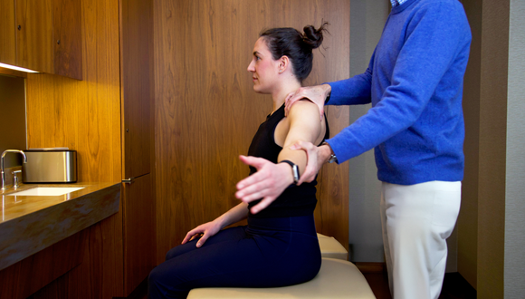 Woman getting chiropractic care.