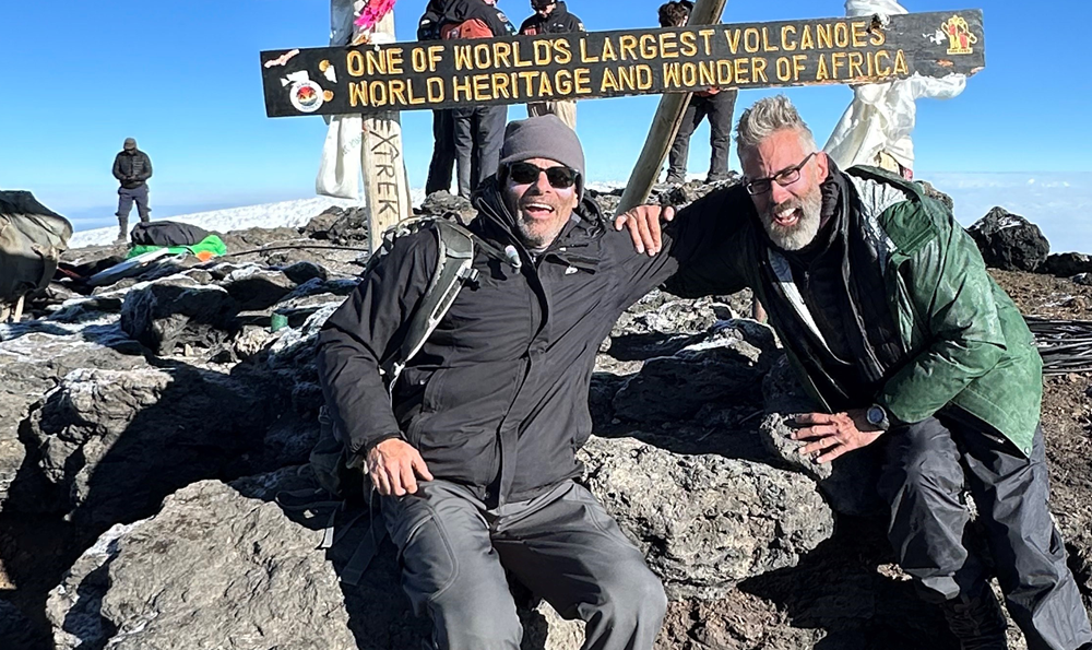 Thomas at the top of Mount Kilimanjaro