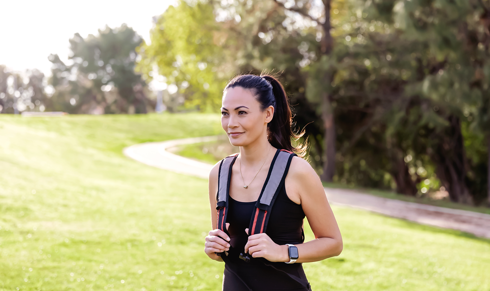 A woman wearing a weighted vest